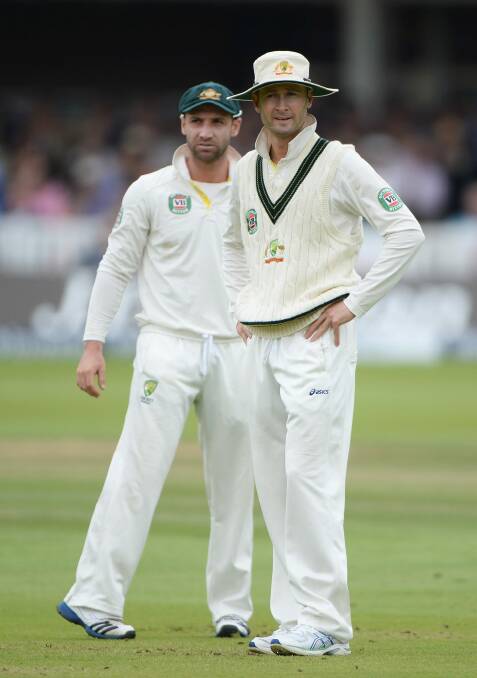 Michael Clarke and Phillip Hughes survey the pitch during a Test match at Lord's in 2013. Photo: Getty Images