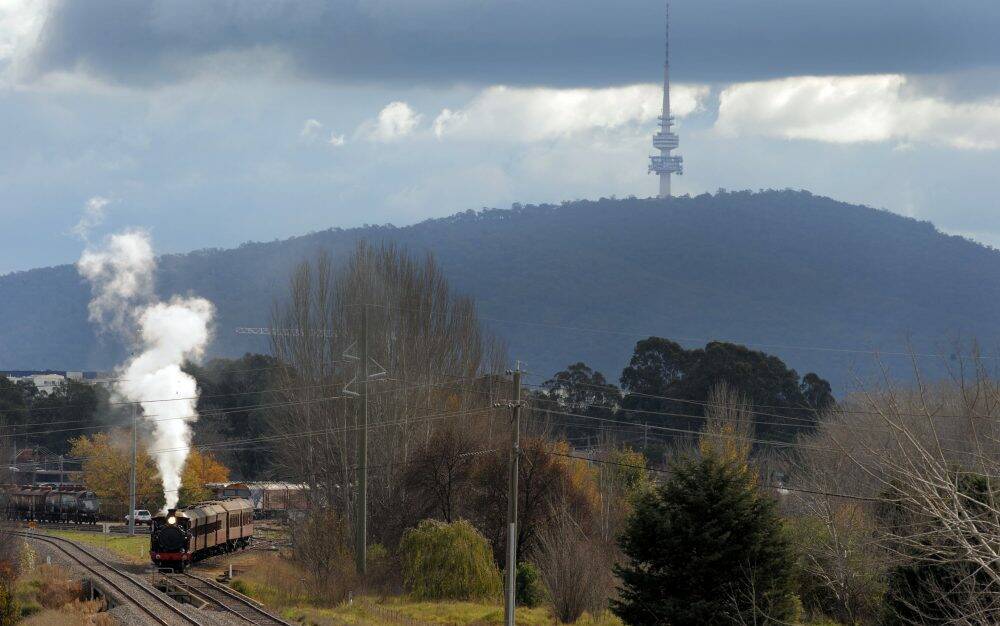 The centenary of rail to Canberra is celebrated with a steam engine ride from the Canberra Railway Museum in Kingston to Queanbeyan station and return. The museum's 3016 locomotive starts its journey.  Photo: Graham Tidy