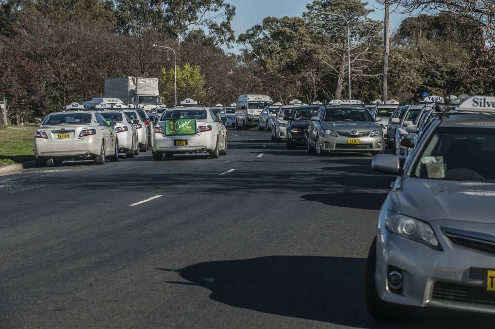 Private owners of ACT taxi plates will wait for another year before pressing for compensation, Phil Button says. Photo: Karleen Minney