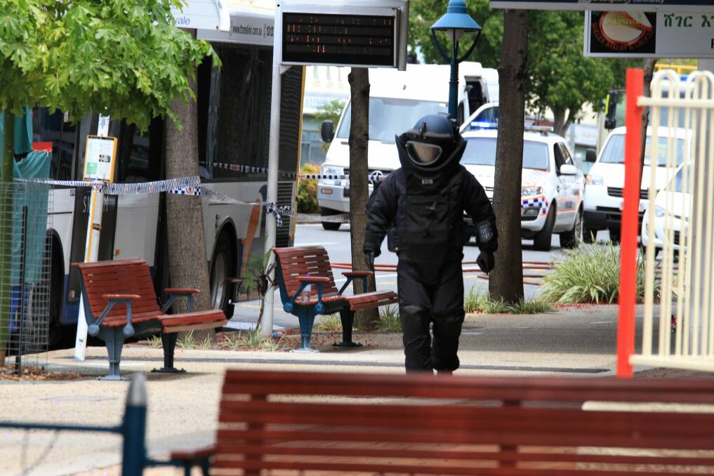 The bomb squad was called in to search the bus. Photo: Jorge Branco