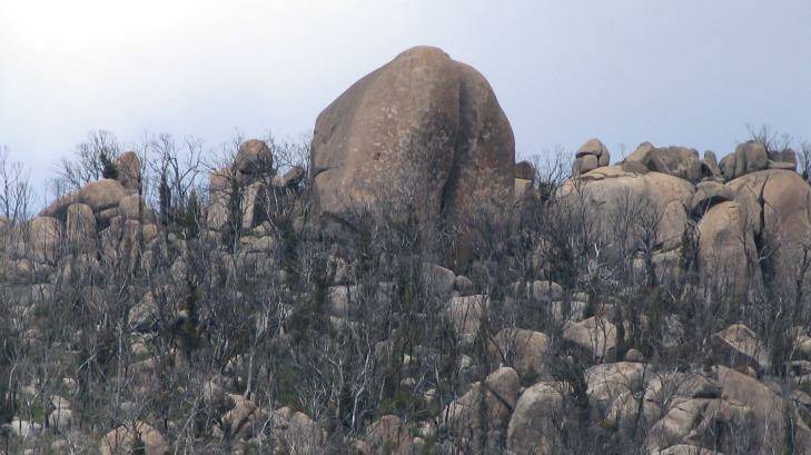 Imposing: Split Rock just after the 2003 bushfires. Photo: John Evans
