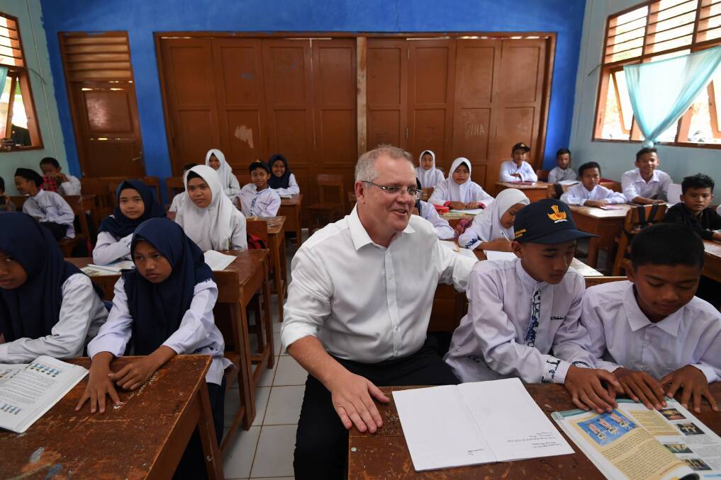 Australian Prime Minister Scott Morrison speaks to students at SMPN 2 Babakan Madang High school in Jakarta, his first overseas trip as PM. Photo: AAP