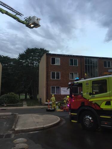 Firefighters attend a fire at a third-floor apartment at Gowrie Court in Narrabundah. Photo: Supplied