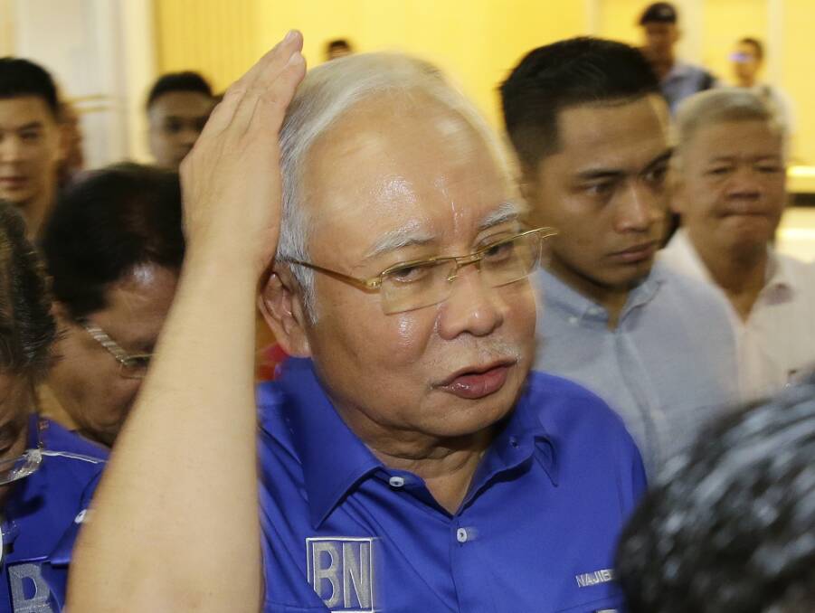 Defeated Malaysian Prime Minister Najib Razak as he prepares to 'concede'. Photo: AP