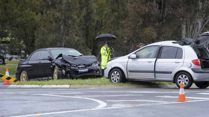 A fatal motor vehicle accident on the corner of Streeton Drive and Namatjira Drive, Weston, near Cooleman Court shopping centre. Photo: Graham Tidy