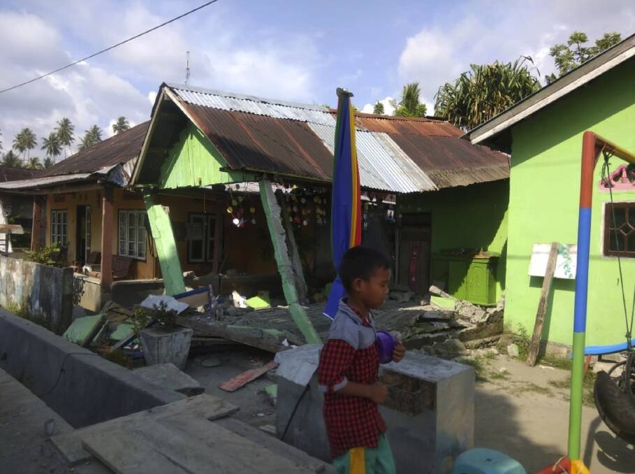 A house in in Donggala, central Sulawesi, Indonesia, on Friday after the initial earthquake hit. Photo: Disaster Management Agency via AP