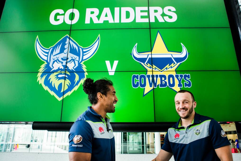 The Canberra Raiders players arive at the Canberra Airport, to go to Townsville for their opening round match against the Cowboys. Raiders player Sia Soliola and Josh Hodgson. Photo: Jamila Toderas Photo: Jamila Toderas