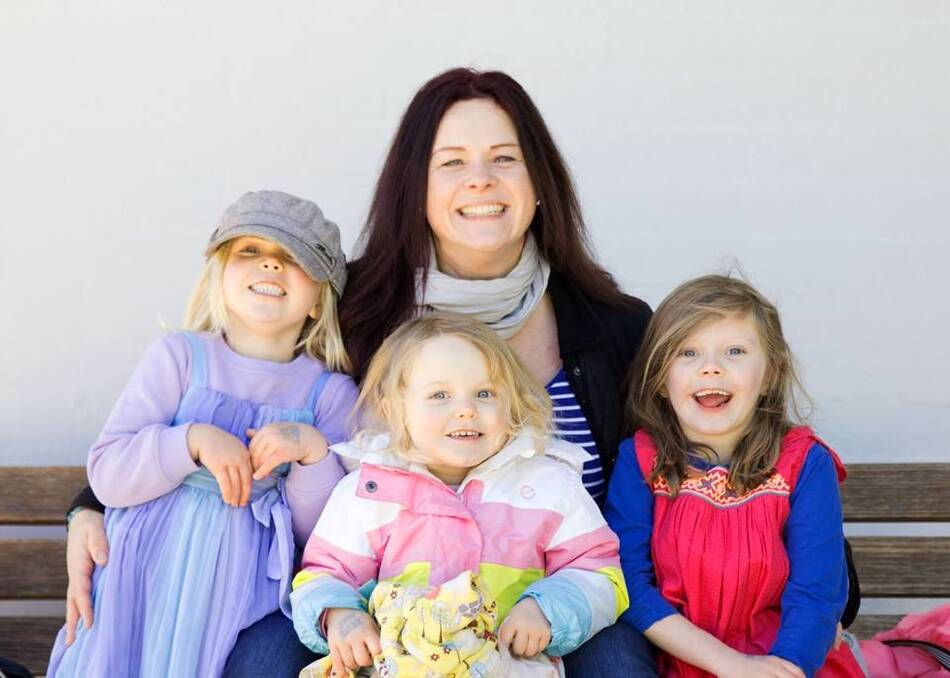 Liz Christiansen with her girls (l-r) Inge, Freyja and Brynn. Freyja is battling a very rare form of cancer. Photo: Darren Paterson Photography