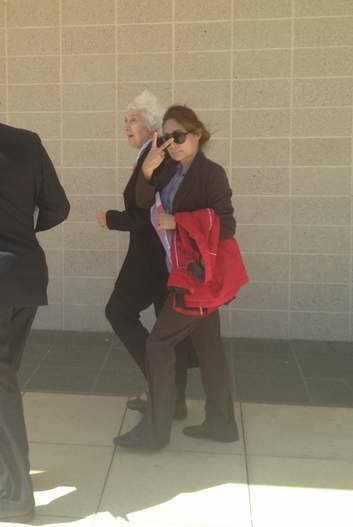 Louise Bai leaving court.