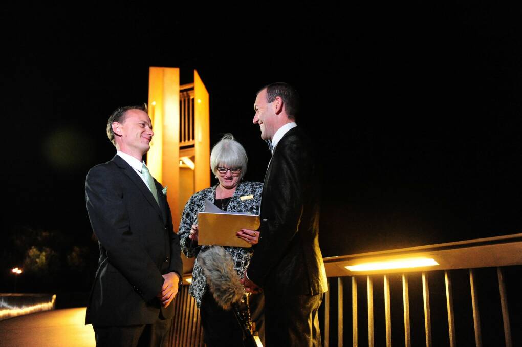 First Australian legal same sex marriage. ACT celebrant Sharyn Gunn officiates over Australia's first Australian legal same sex marriage between Alan Wright (left) and Joel Player, at one minute past 12 midnight on Saturday, December 7, 2013. Photo: Karleen Minney