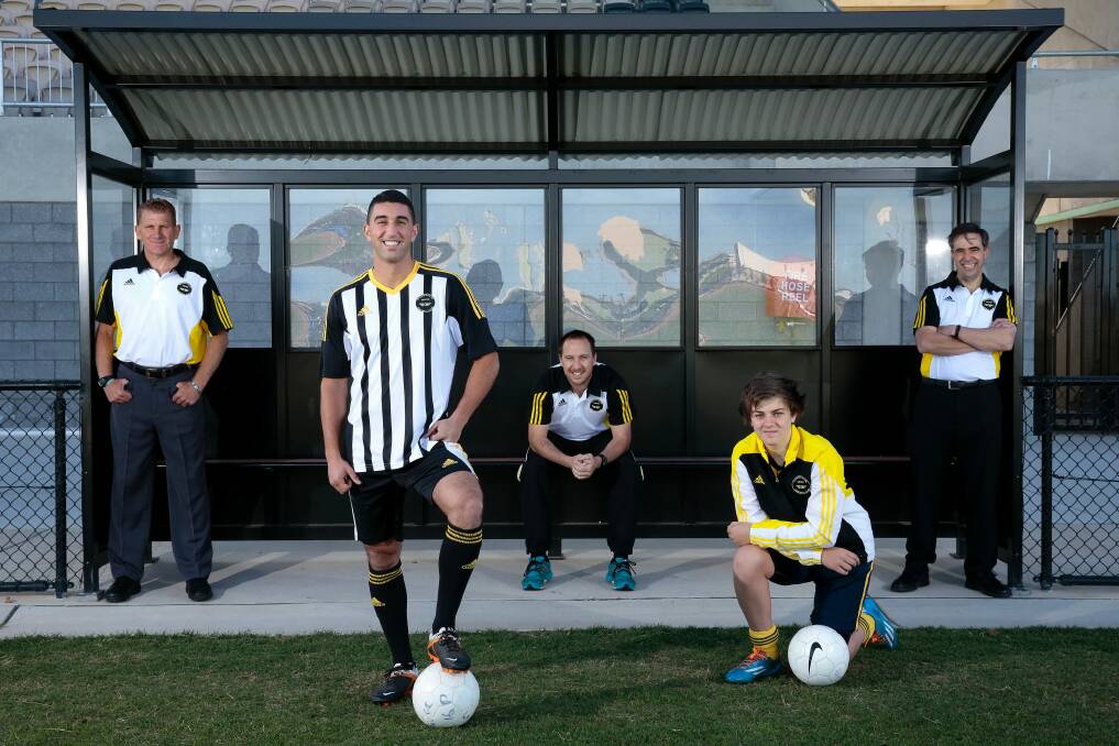 Gungahlin United could cap a stunning first year in the Capital Fooball National Premier League by qualifying for the FFA Cup on Saturday. From left, men's head coach Claudio Canosa, assistant head coach Mitch Stevens, president Ricardo Alberto, front from left, men's premier league player Stephen Domenici and under-18 player Frazier Phillips. Photo: Jeffrey Chan