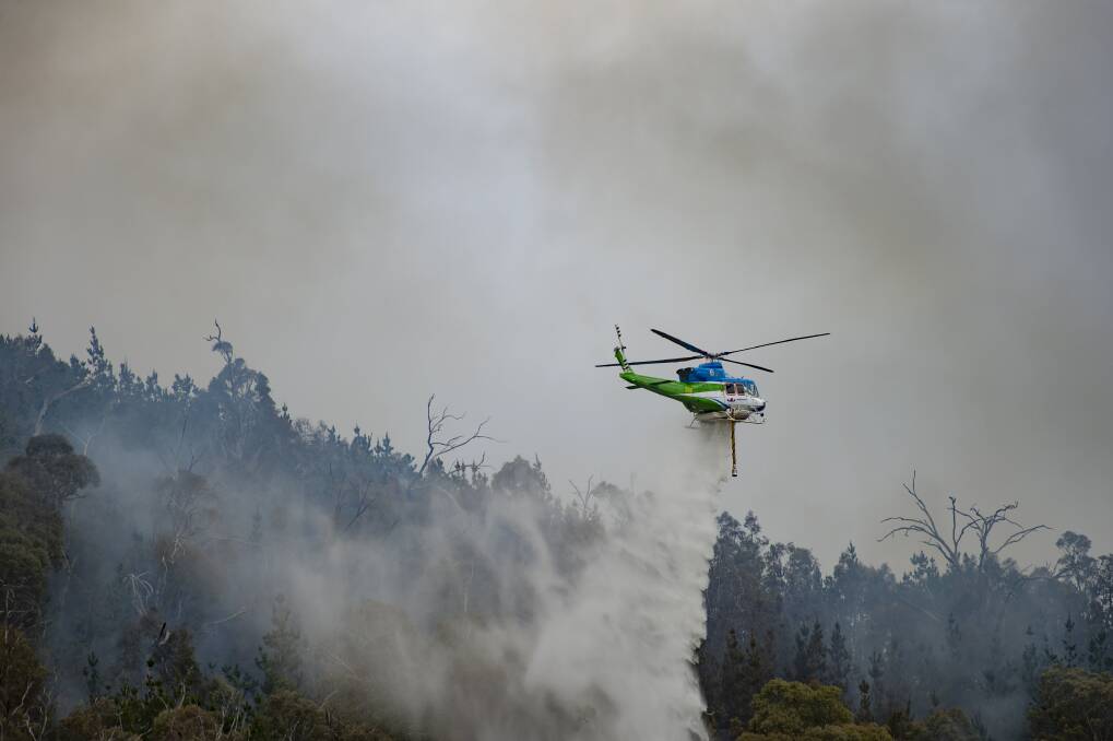 Several types of firefighting aircraft tackled the Pierces Creek Fire in November. Photo: Sitthixay Ditthavong