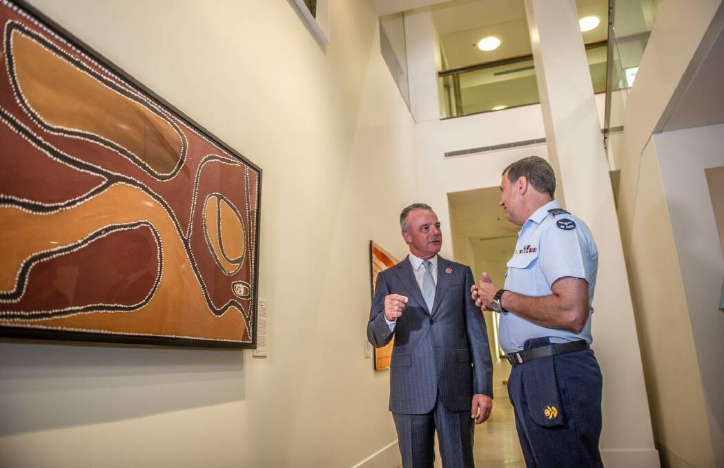 Australian War Memorial director Dr Brendan Nelson and Squadron Leader Gary Oakley at the unveiling of Ruby Plains Massacre 1. Photo: karleen minney