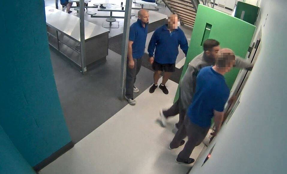 Marcus Rappel, far left, and Daniel Grech, throwing a punch, were sentenced for the Alexander Maconochie Centre assault. Photo: Supplied