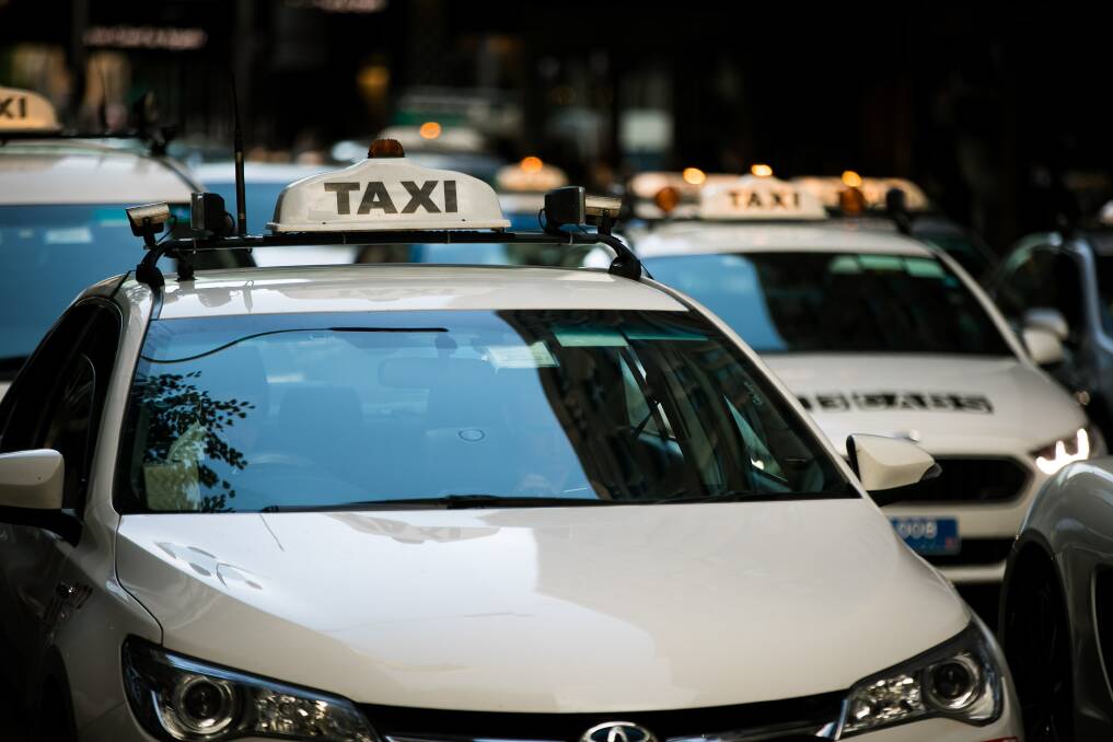 Taxi licence owners are preparing to launch legal action against the Queensland government. Photo: Anna Kucera