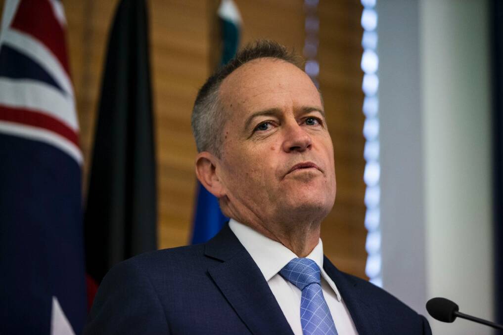 By threatening to withdraw approval for the Adani project, Bill Shorten isn't threatening to change the law, he is simply threatening to enforce it. Photo: Dominic Lorrimer
