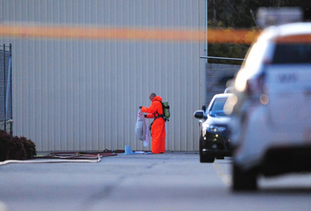 Police investigate the alleged drug lab in Hume In August. Photo: Melissa Adams
