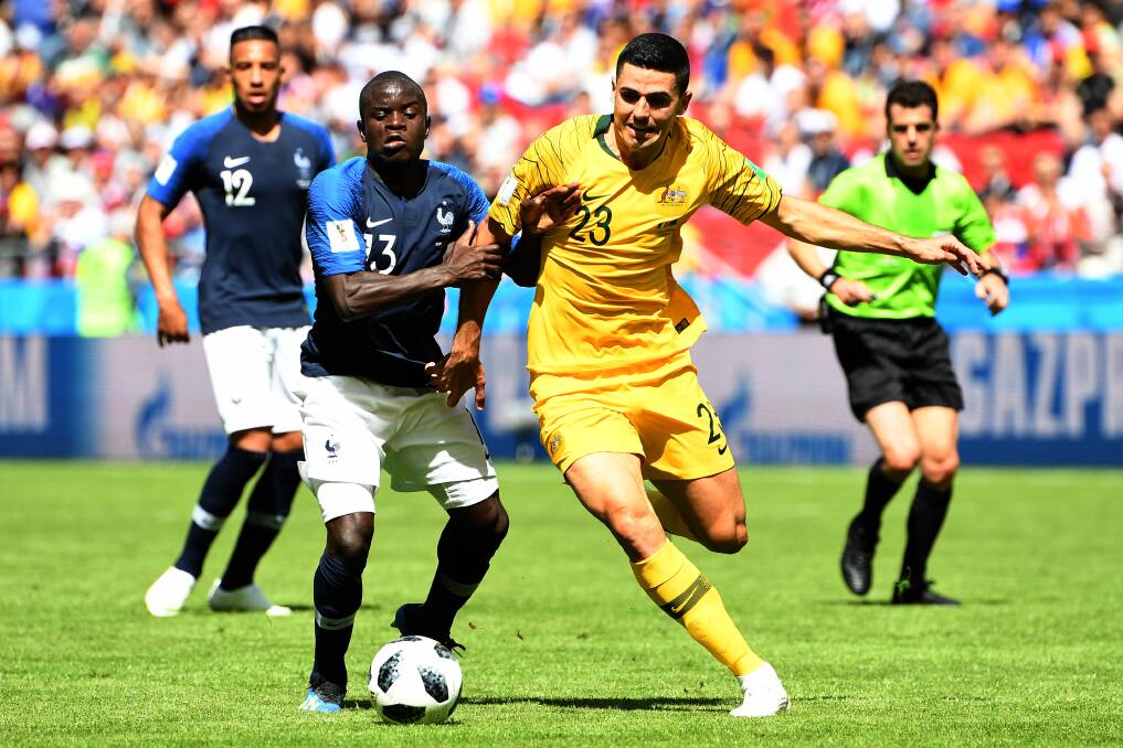 Canberra export Tom Rogic working hard in the Socceroos World Cup opener against France.  Photo: AAP