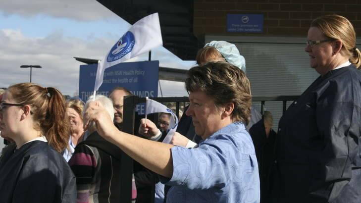 The NSW Nurses Association  with protesters outside Queanbeyan District Hospital in June. Photo: Kim Pham