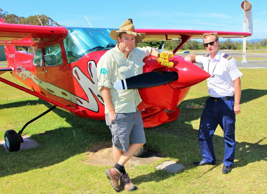 Tim the Yowie Man joins pilot Kyle Mills preflight at Merimbula airport, south coast. Photo: Dave Moore