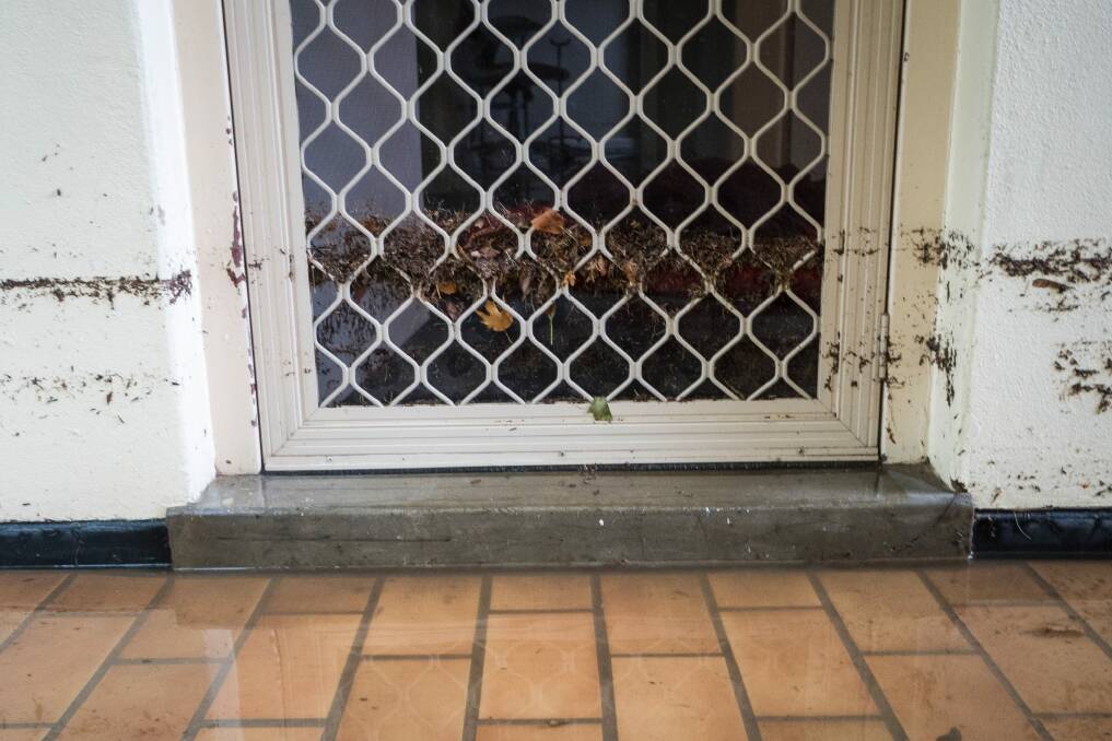 Outside Gary Carter's flooded apartment at O'Connor.  Photo: Dion Georgopoulos