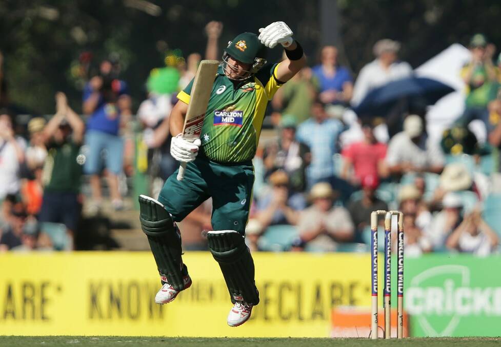 Australian batsman Aaron Finch celebrates scoring a century against South Africa at Manuka Oval last year. Photo: Mark Metcalfe