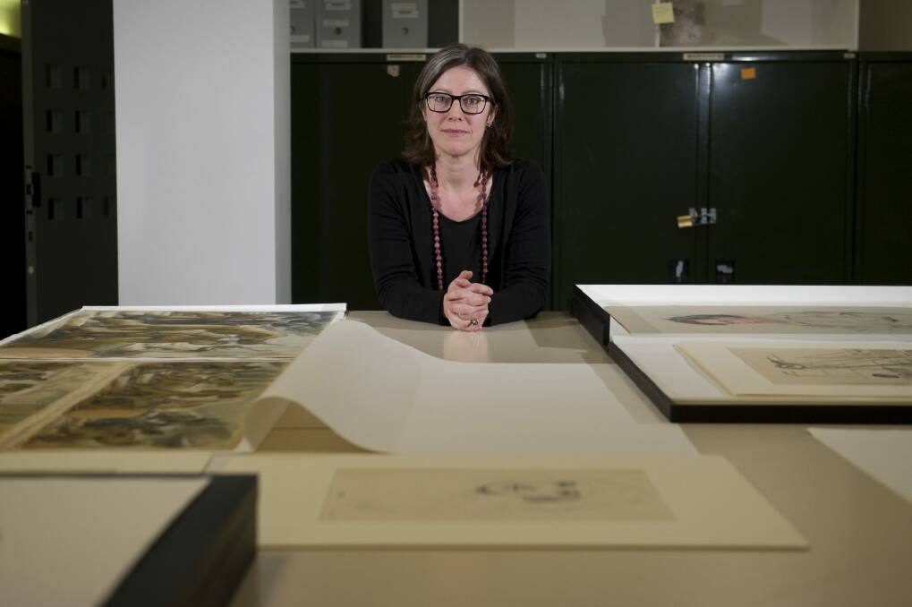 Curator Bridie Macgillicuddy of the Girl Operatives: Women's War Work showcases the artwork of women during the Second World War. Photo: Jay Cronan