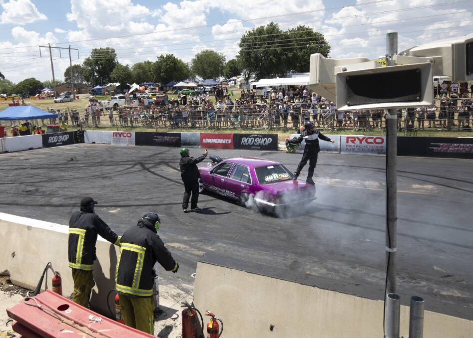 A co-driver captures his driver's celebration after the burnout eliminations at Summernats Photo:  Sitthixay Ditthavong