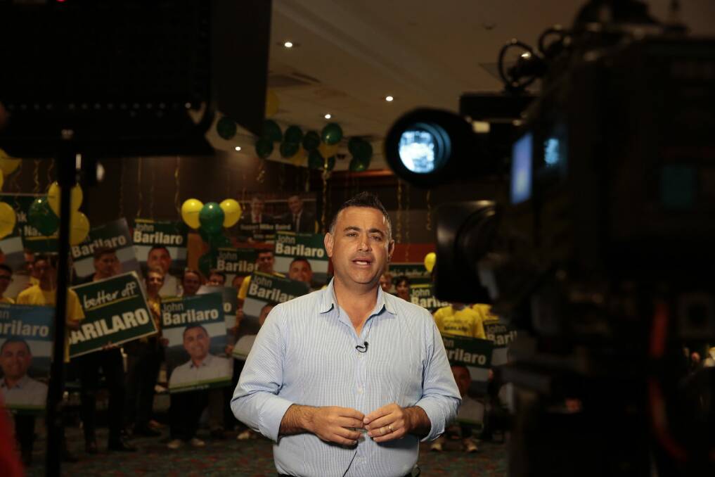 Nationals John Barilaro is interviewed while waiting for results at the Roos Club in Queanbeyan.  Photo: Jeffrey Chan