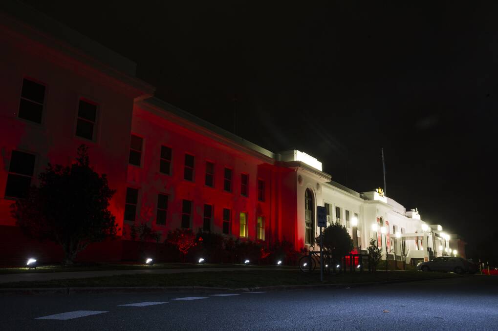 Old Parliament House lit up for cystic fibrosis awareness. Photo: Dion Georgopoulo