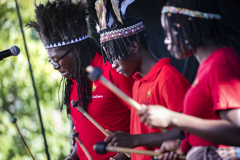 Zimbabwean group Zim Pride perform in Civic Square on day one of the multicultural festival. Photo: Sitthixay Ditthavong