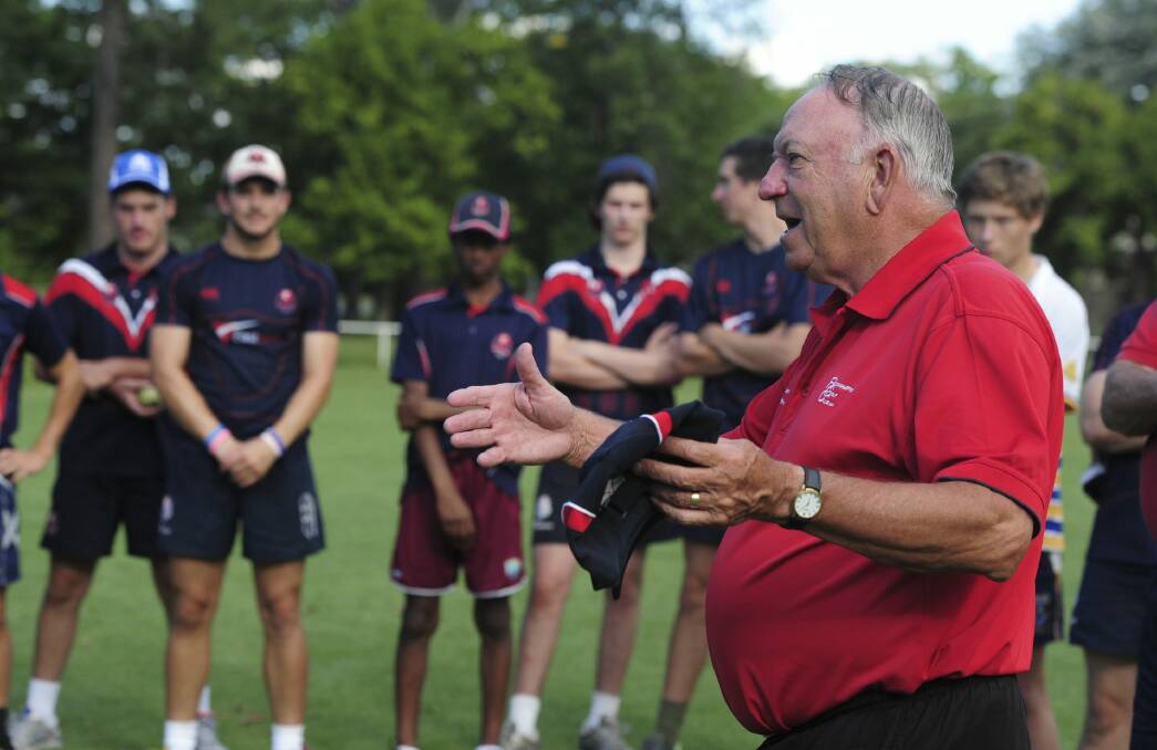 Former Australian test cricketer, Doug Walters, shares his knowledge with senior squad members of the Eastlake Cricket team at Kingston Oval. Photo: Graham Tidy