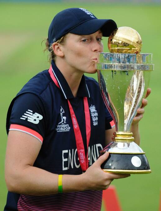 England captain Heather Knight celebrates with trophy after England won the Women's World Cup. Photo: AP