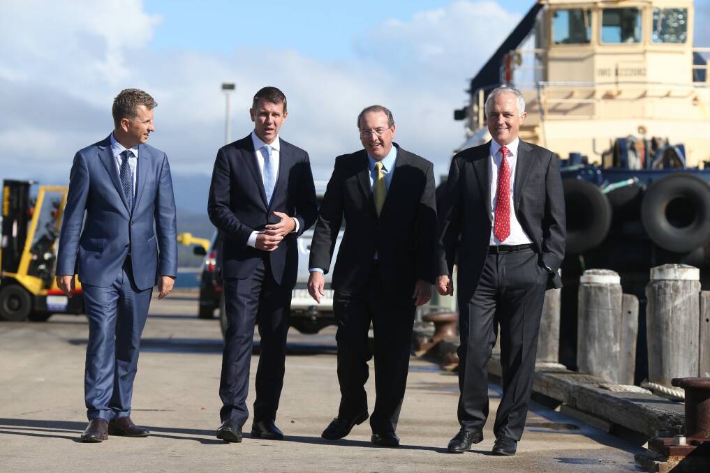 No seat can compete with Eden-Monaro for visits from party leaders.
Prime Minister Malcolm Turnbull visited the wharf in Eden on the NSW south coast with NSW Premier Mike Baird, State minister Andrew Constance and local member Peter Hendy. Photo: Andrew Meares