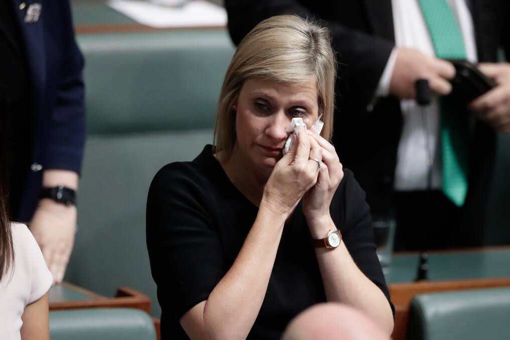 Labor MP Susan Lamb wipes away tears after delivering a statement on her citizenship in Parliament on Wednesday. Photo: Alex Ellinghausen