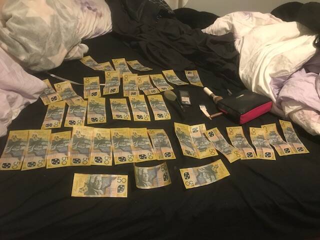 Cash that was seized by police during a search in Rivett on June 5. Photo: ACT Policing