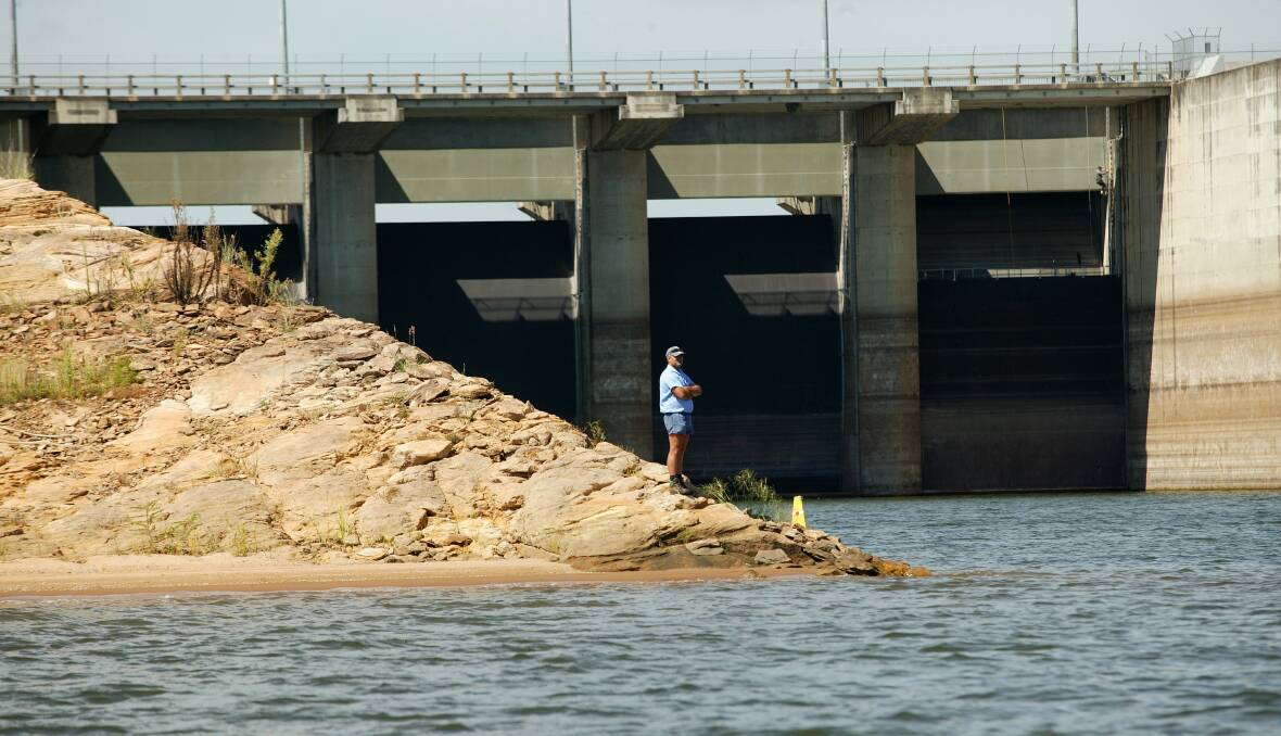 Wivenhoe Dam, which supplies water to south-east Queensland, is below 70 per cent capacity. Photo: Robert Rough