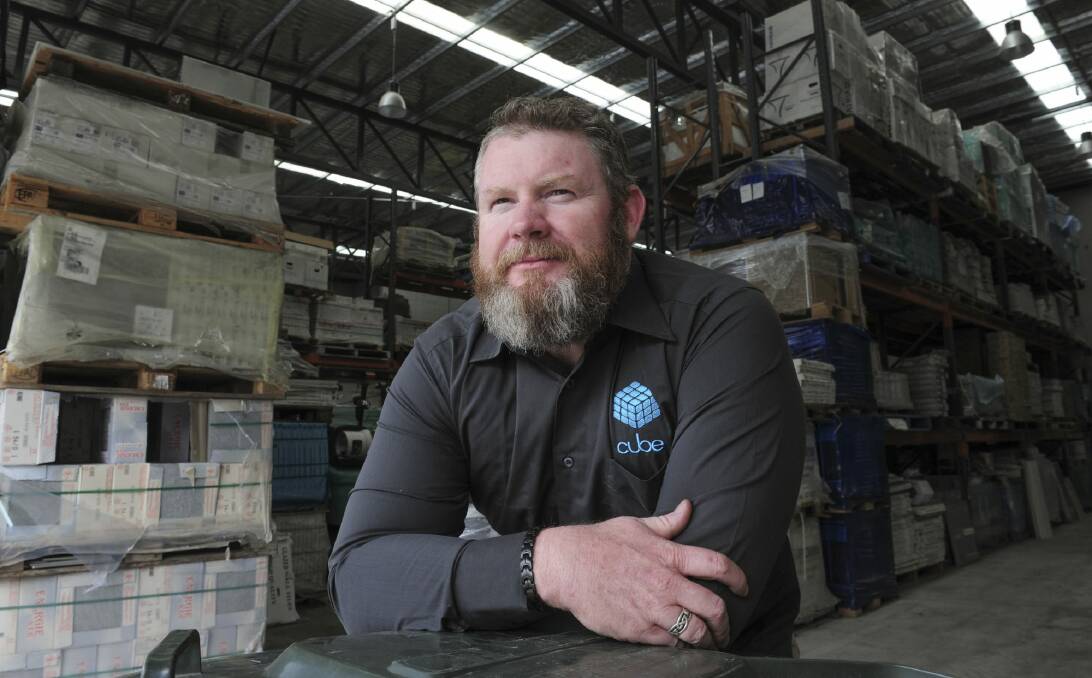 Proprietor of Fyshwick-based, Cube furniture, Chris DeVoy, has had an extended legal battle with major builder Joss Constructions. Photo: Graham Tidy