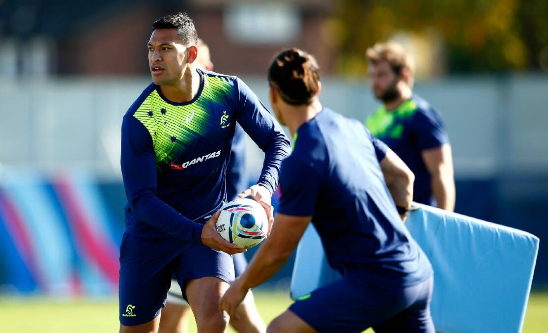 Stretched: Israel Folau at training this week. Photo: Getty Images