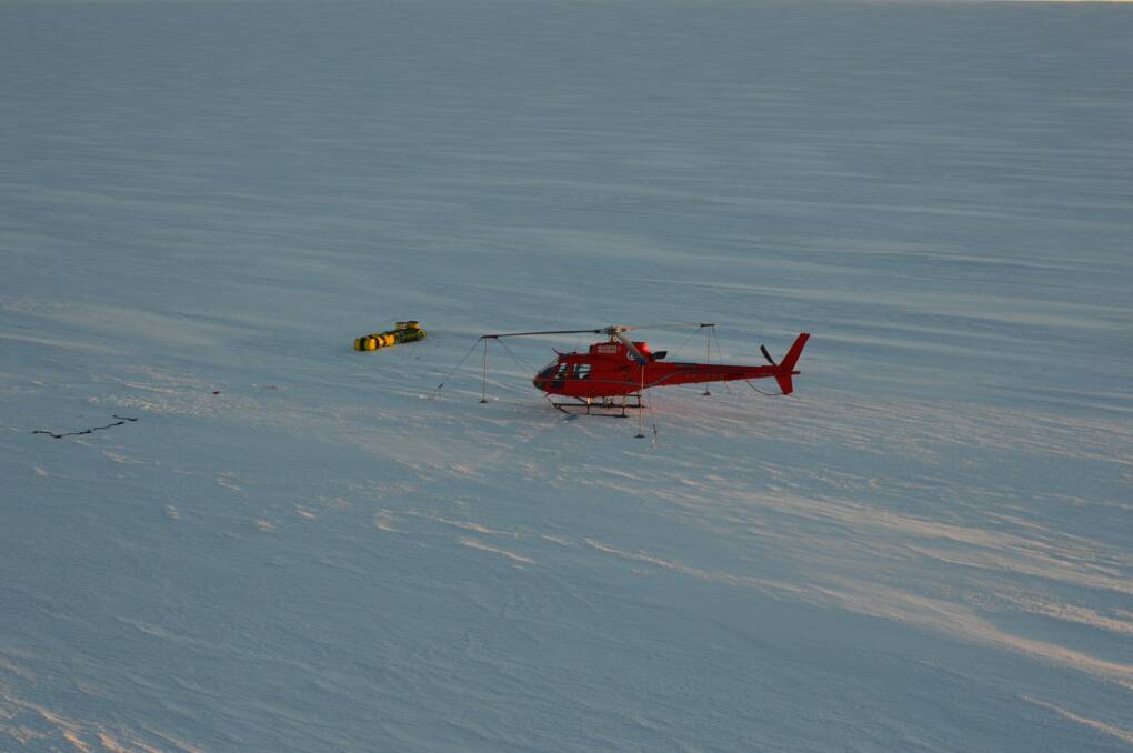 David Wood's helicopter at the western ice shelf after he fell into a crevasse on January 11, 2016. Photo: Supplied