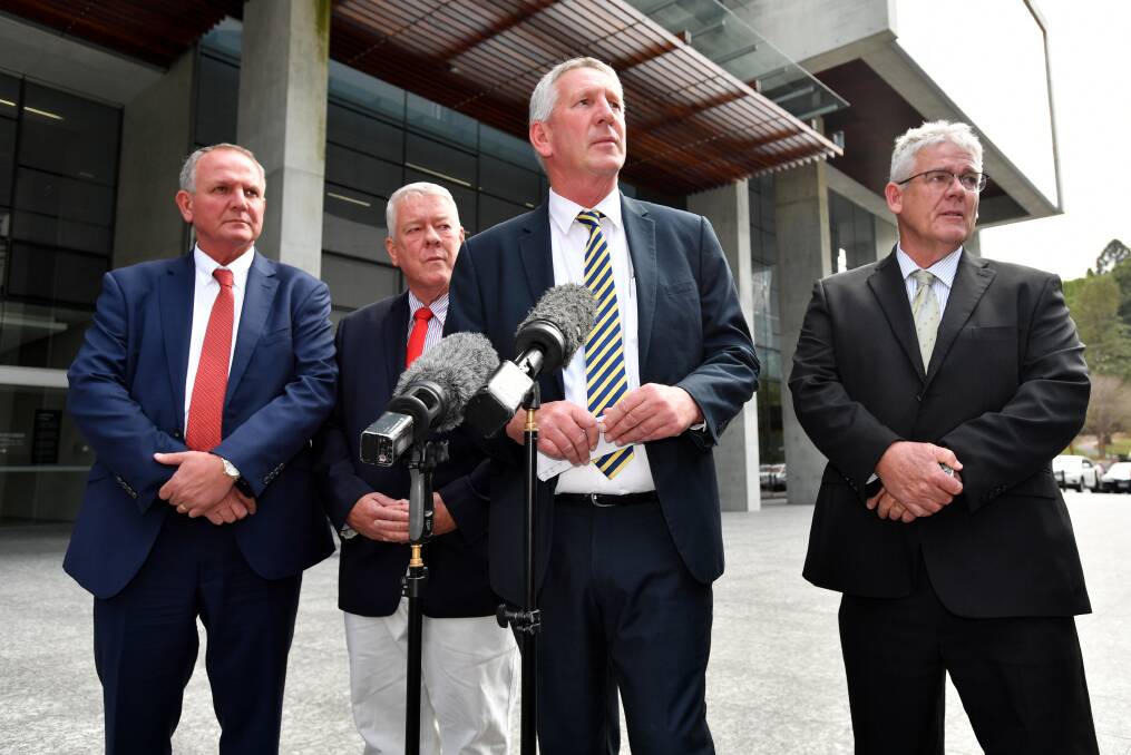 Joe, John, Dennis and Neill Wagner speak to the media outside the Supreme Court after the verdict in their defamation proceedings against Alan Jones.  Photo: AAP/Darren England