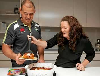 GOOD ONYA MUM: Lisa Campese serves up her regular pre-game treat for son Terry. Photo: Katherine Griffiths