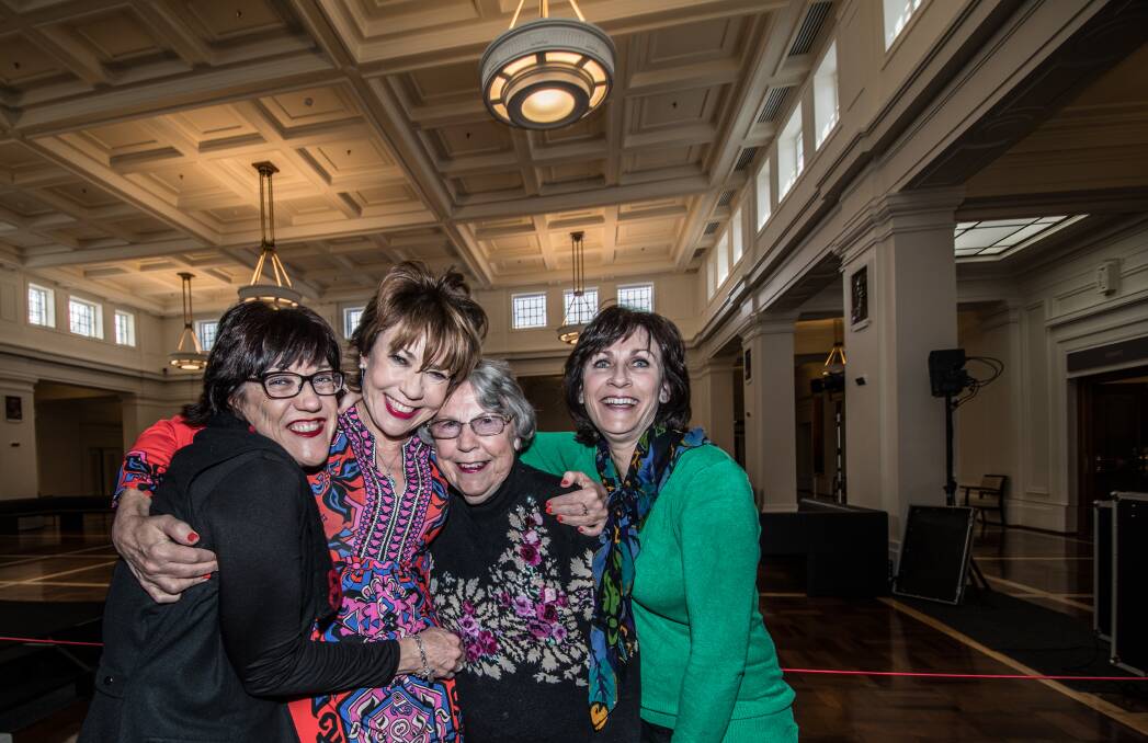 Kathy Lette (second left) at Old Parliament House on Friday with her sisters Elizabeth and Carolyn and mum Val. Photo: Karleen Minney