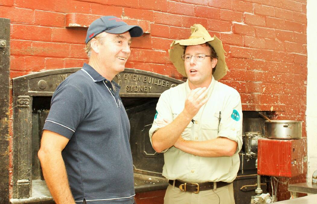 Braidwood bakery's John Woodman shares the secrets of his pies with Tim the Yowie Man.  Photo: Kirilly Bush