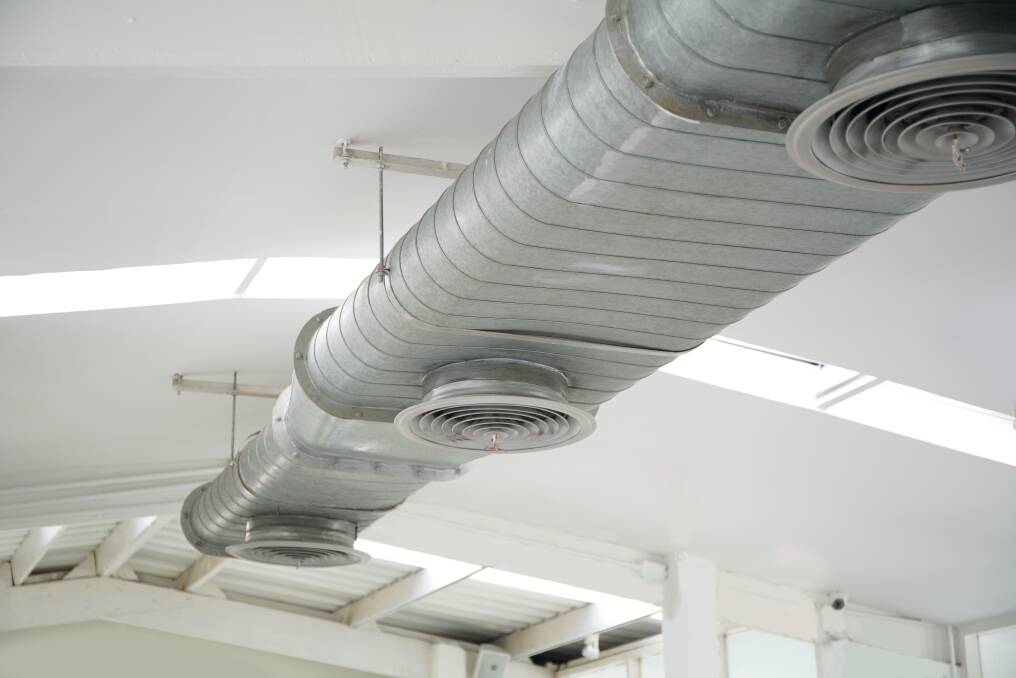 Research suggests office airconditioning systems should be running a few degrees warmer. Photo: Shutterstock