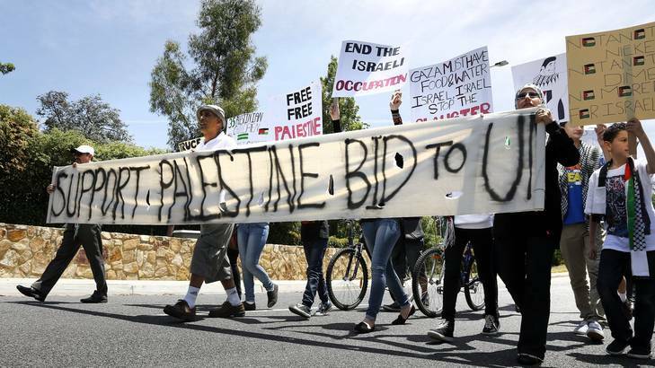 Supporters for Palestine rights march out the front of the Embassy of Israel in Yarralumla. Photo: Jeffrey Chan