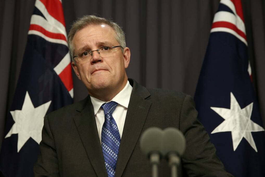 Treasurer Scott Morrison laments the "pitched battle" over industrial relations reform that has pitted business against unions is "boring, it's not helpful". Photo: Alex Ellinghausen