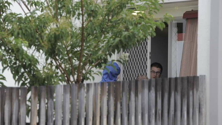 AFP Forensic officers and detectives attend a Chapman home in relation to a murder in Phillip. Photo: Graham Tidy