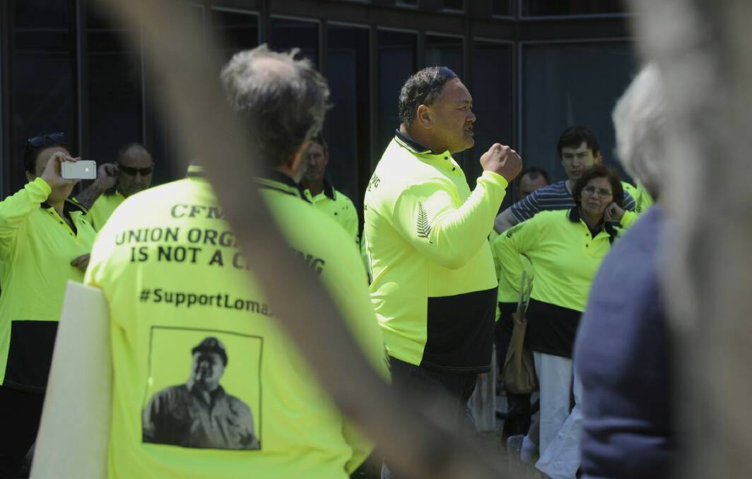 CFMEU organiser John Lomax addressing his supporters before entering the ACT Magistrates Court. Photo: Graham Tidy