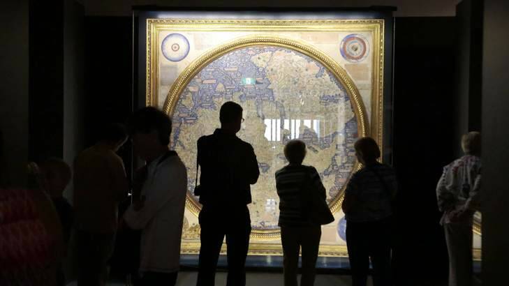 Visitors taking a look at the Map of the World 1448-1453 by Fra Mauro. Photo: Jeffrey Chan